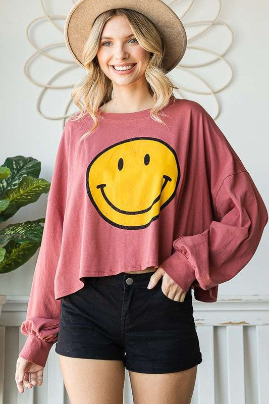 TOP CORTO MANGA LARGA CARA SONRISA