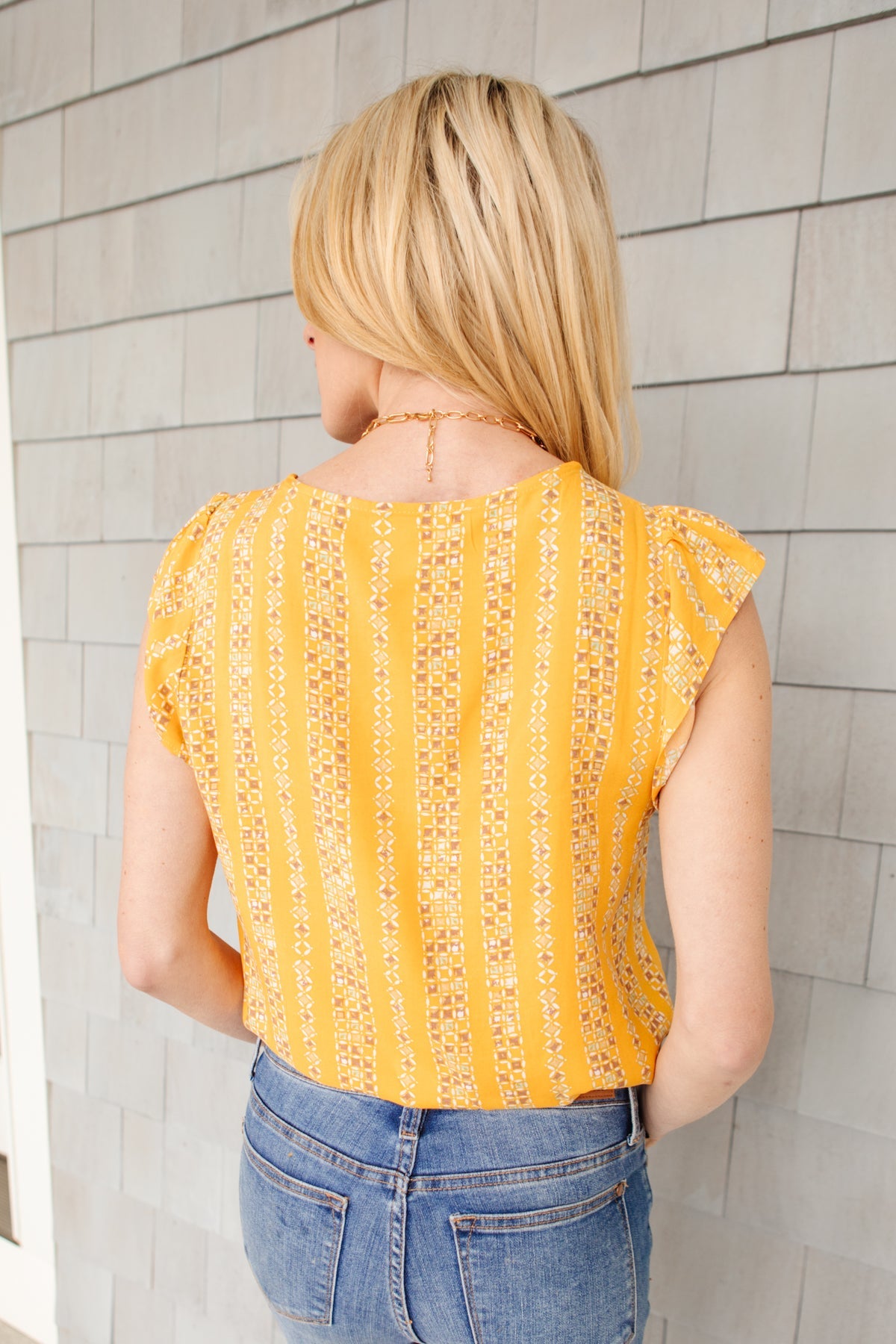 Blusa amarilla suave